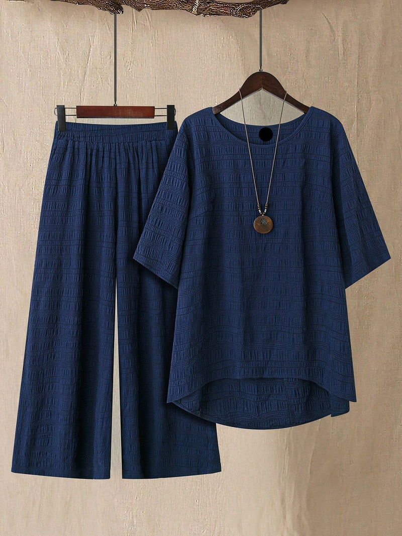 Conjunto camisa em gola redonda e calças de perna larga Ligía