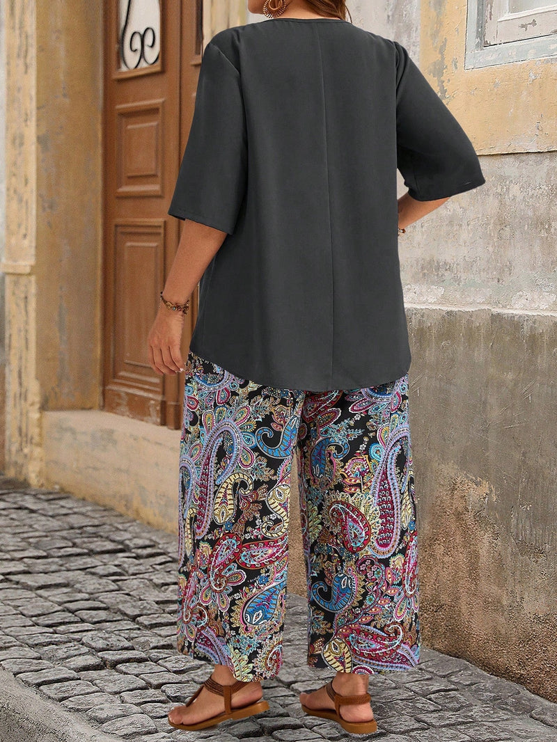 Conjunto camisa em gola redonda e calças de perna larga Ligía