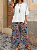 Conjunto camisa em gola redonda e calças de perna larga Ligía