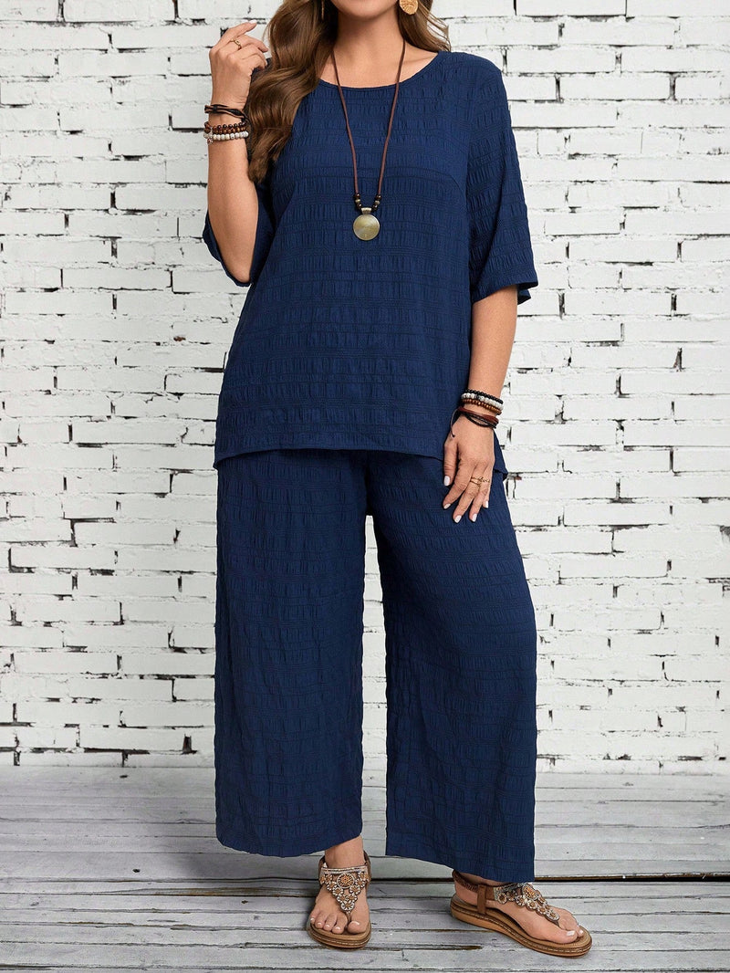 Conjunto camisa em gola redonda e calças de perna larga Ligía